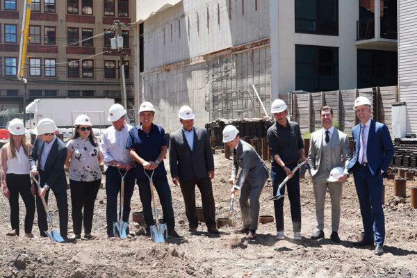 The development and marketing team joined Jersey City Mayor Steven Fulop to commemorate the groundbreaking. Image courtesy of Nest Seekers International.